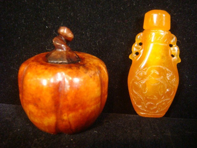 Pumpkin Shaped and Jasper Glass Snuff Bottles:: Pumpkin Shaped and Carnelian Glass Snuff Bottles: Handcarved Pumpkin with Removable Stem is 1 1/2"T. Incised Double Handled Bottle is 2"T and 1"W. (100-200)