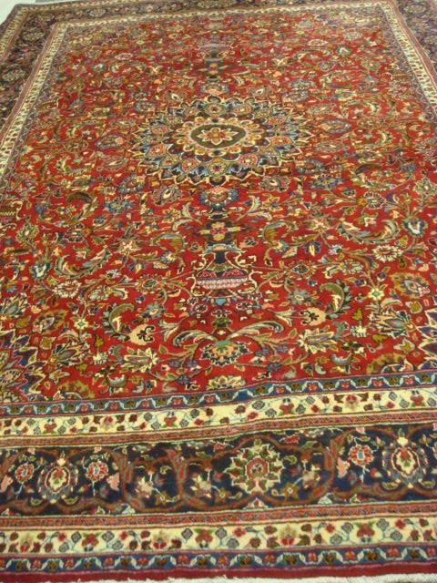 Hand-woven Wool Mashad Persian Tribal Rug:: Hand-woven Wool Mashad Persian Tribal Rug: Mirrored Center Border Flanked by 3 Guard Borders on Each Side. Quarter Medallion Corners with Corresponding Center Medallion. Curvilinear Patterned Center i