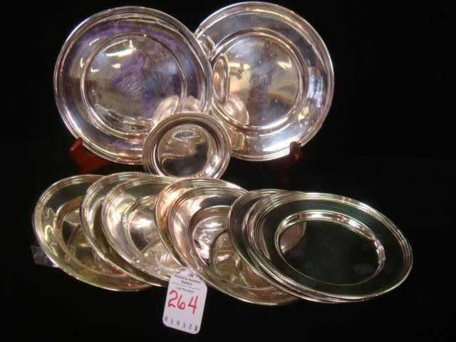 Eleven Assorted Sterling Silver Plates: Eleven Assorted Sterling Silver Plates: Two Gorham 6" Plates, One with Monogram, One Dated 1937-1962. Eight 5" Plates Marked Sterling. Newport Sterling 3 1/2" Coaster with H Monogram. All have Rolled