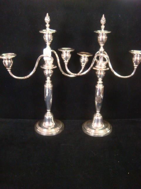 Pair of GORHAM Silver Plate Three Arm Candelabra: Pair of GORHAM Silver Plate Three Arm Candelabra: Each is 18"T with Flame Finial in Center. Removable Candle Cups. Top Part Unscrews to Make Single Candlestick. Monogram on Stem. (100-200)