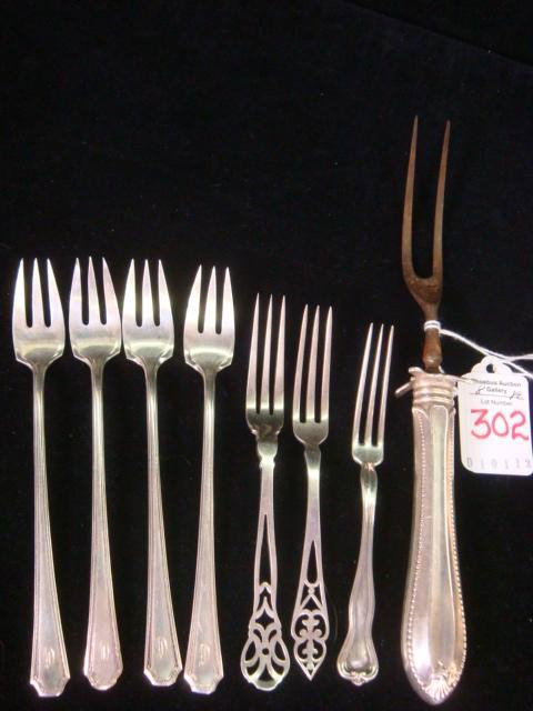 Eight Assorted Sterling Silver Forks:: Eight Assorted Sterling Silver Forks: Four Towle Lady Constance Seafood Forks, Three Strawberry Forks, Watson King George, Gorham with Pierced Handle and Watson, Silver Handled Carving Fork. 3.76 Oz M
