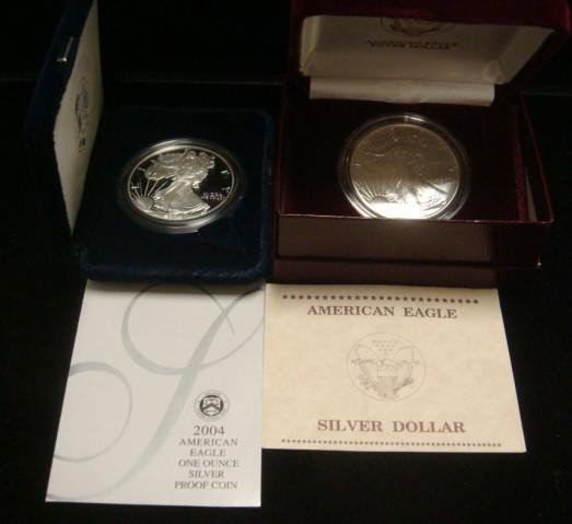 Two AMERICAN SILVER EAGLE Dollar Coins: Two AMERICAN SILVER EAGLE Dollar Coins: Each One Troy Ounce of Silver with Adolph A Weinman's Full Length Figure of Lady Liberty Enveloped in the American Flag in Full Stride. 1999 and 2004 Coins. In