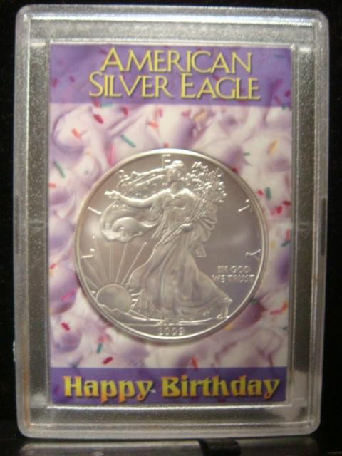 AMERICAN EAGLE 2009 Silver Proof Dollar Coin:: AMERICAN EAGLE 2009 Silver Proof Dollar Coin: In "Happy Birthday" Protective Plastic Cover. Excellent Matte Proof Luster. Walking Liberty on Obverse. (50-100)