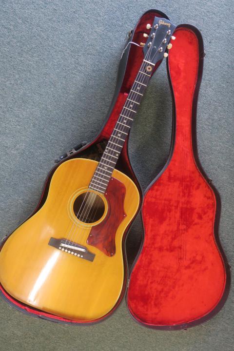 GIBSON J Series Acoustic Guitar, J-50ADJ, CA 1965:: GIBSON J Series Acoustic Guitar, J-50ADJ, CA 1965: Faint Serial Number on Back of Head Appears to be 381581. Natural Finish on Front, Mahogany Back. Gibson at top of Peg Board, Very Good Condition, Pi