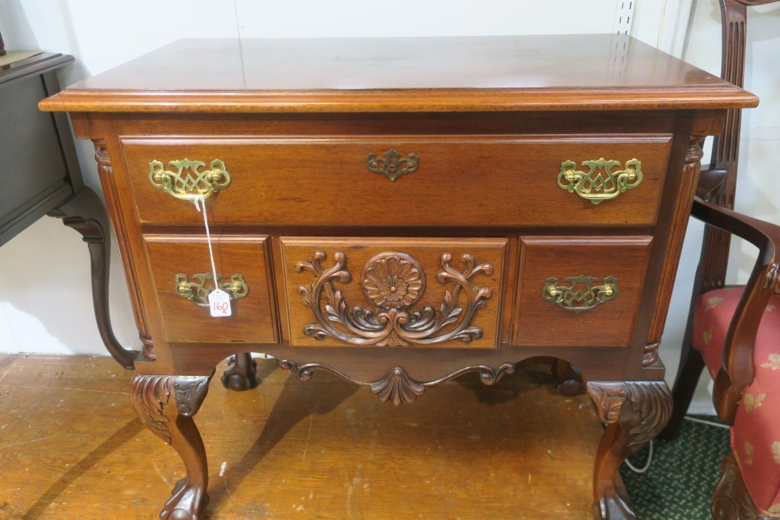 Cherry Chippendale Style Lowboy:: Cherry Chippendale Style Lowboy: Single Long Drawer Over 2 Small Drawers with Raised Carved Center Drawer. Brass Pulls and Faux Escutcheon. Four Ball and Claw Legs with Carved Knees. 31 1/4"t, 33 1/2"