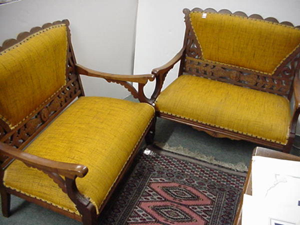 Pair of Victorian Walnut Carved Settees: Pair of Victorian Walnut Carved Settees: Carved Back, Back Brace, Apron and ArmRest Supports. Turned Front Legs. 15"T at Seat.