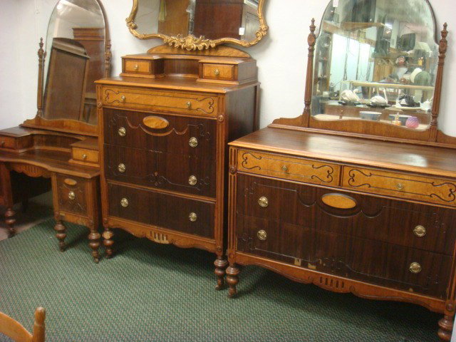Four Piece Depression Era Walnut Bedroom Set:: Four Piece Depression Era Walnut Bedroom Set: Includes Dressing Table with Glove Boxes, Chest of Drawers with Turned Legs, Dresser with Mirror and Double Door Wardrobe. Finish is Two Tone Oriental Woo
