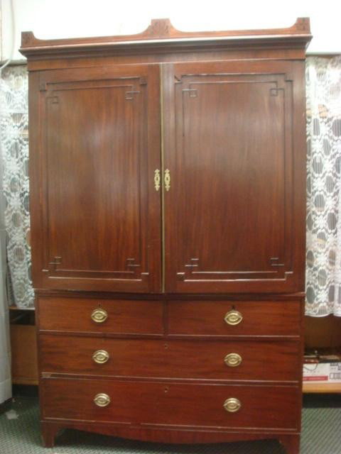 19th C Mahogany 2 Piece Linen Press:: 19th C Mahogany 2 Piece Linen Press: Top Has removable Crown with Double Doors Opening to Reveal Pull Out Linen Shelves. Lower Cabinet with Blind Door Storage. 53" X 84"T X 21". (500-900)