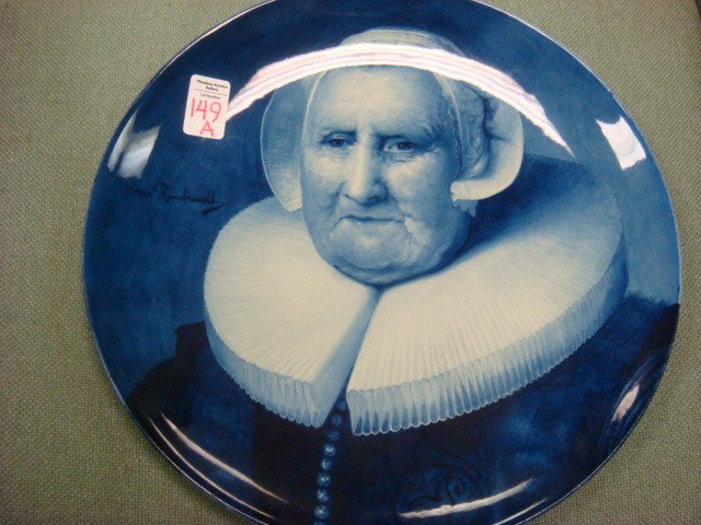 Late 19th C. DELFT Pottery Portrait Plaque:: Late 19th C. DELFT Pottery Portrait Plaque: "Portrait of Old Woman" by Rembrandt transposed to 13 1/2" Charger. Blue and White Glaze. Impressed and Hand Painted Marks on Back. Metal Hanger. From Histo