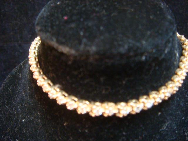 14KT 7" Diamond Tennis Bracelet:: 14KT 7" Diamond Tennis Bracelet: Yellow Gold with Round Brilliant Diamonds Set in 4 Prongs. Tab Inset Box Clasp with Safety. Polished Finish. (800-1000)