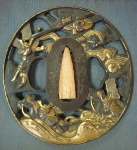 Japanese TUSBA, Sword Guard, Edo Period in Case: Japanese TUSBA, Sword Guard, Edo Period in Case: Depiction of Samurai Defeating Mongol Invaders at Battle of Hakata Bay. Samurai Horseman Rode into the Bay to Slaughter KAMAKIZE Wrecked Mongol Warrior