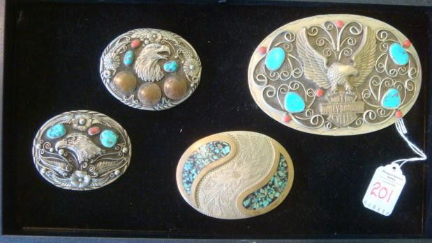 Four Southwestern Harley, SSI, German Belt Buckles: Four Southwestern Harley, SSI, German Belt Buckles: Eagle with Red Coral and Turquoise, Silvertone, SSI Handcrafter. 3 1/2"W, One with 1900's Indian Head Pennies. Harley Davidson with Red Coral and Tu