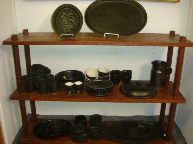 Forty Pieces of Black Stoneware:: Forty Pieces of Black Stoneware: Marks Include Bennington Potters, Vermont, 1950's French Vallauris and Hall. Bowls, Plates, Platters, Soup and Egg Cups, Pitcher, Brule Cups in Both Gloss and Matte Fi