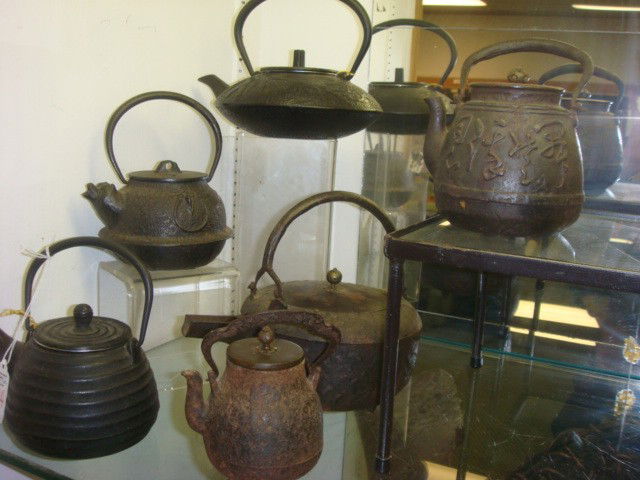 Six Cast Iron Asian Tea Kettle Replicas: Six Cast Iron Asian Tea Kettle Replicas: Tetsuban or Cast Iron Pots were First Used Throughout Japan as Kettles to Boil Water Over an Open Fire. Some with Tea Strainers. 5 1/2" to 7"T. (100-200)
