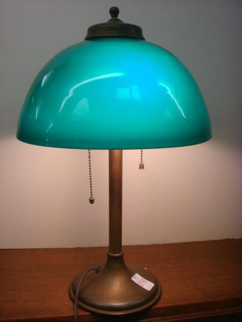 Metal Double Fixture Lamp with Green Glass Shade:: Metal Double Fixture Lamp with Green Glass Shade: Vintage Brassed Metal Lamp Base with Double Light is 19"T. Green and White Cased Glass Shade is 12"D. (40-60)