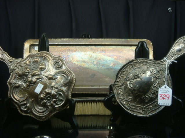 Silver Plate Dresser Tray, Art Nouveau Mirrors, Br: Silver Plate Dresser Tray, Art Nouveau Mirrors, Brush: Tray is 6" X 14 1/4". 9 1/2" and 10" Hand Mirrors (One has 1905 Patent Date). 7"L Crescent Shaped Sterling Handled Brush. (50-90)