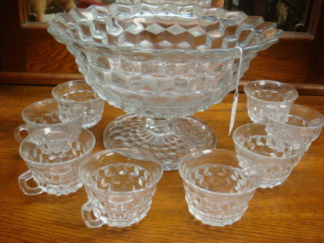 FOSTORIA AMERICAN Tom & Jerry Punch Bowl and 8 Cups: FOSTORIA AMERICAN Tom & Jerry Punch Bowl and 8 Cups: Pedestal Bowl is 8"T and 13" Diameter. Each Cup is 2 1/2"T With Polished Foot Rims. Fire Polished. (100-200)
