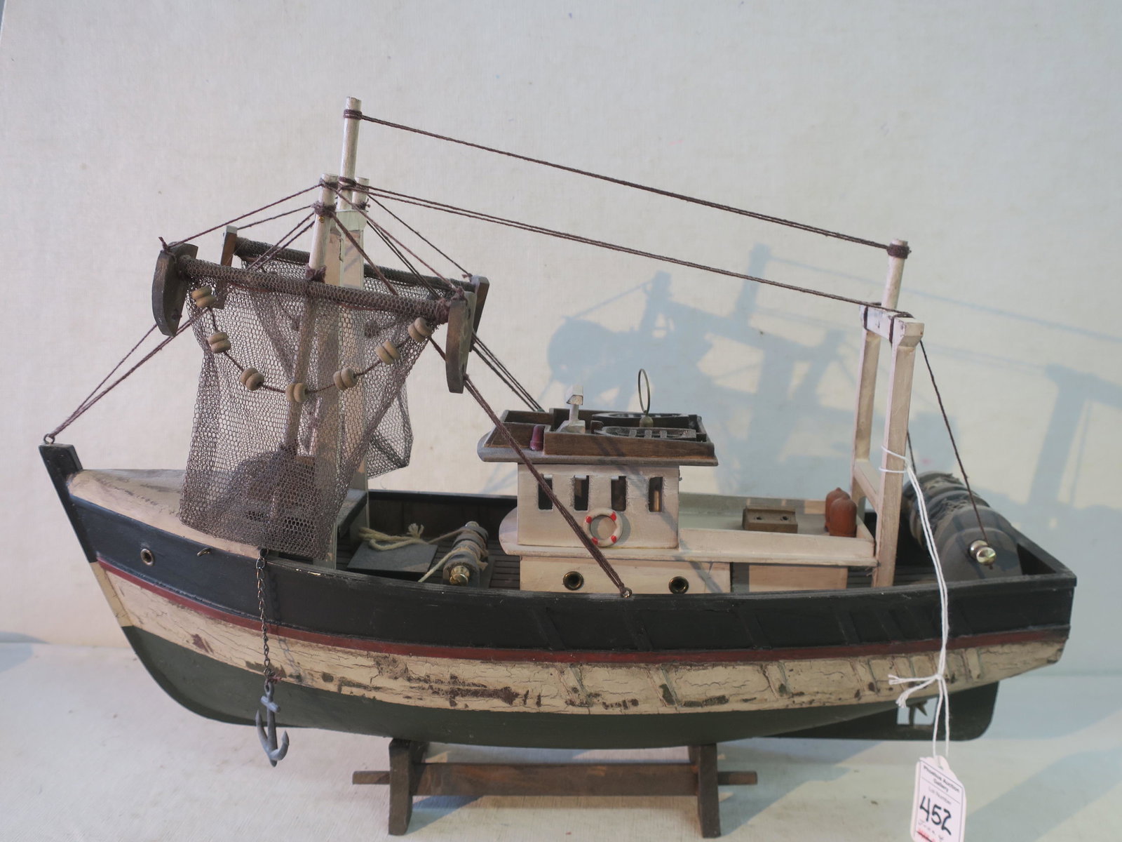Wooden Model of Deep Sea Tuna Boat:: Wooden Model of Deep Sea Tuna Boat: Drag Winches on the Stern to bring in Nets. Life Boats on Top of Bridge Deck. Nets Drying on the Forecastle and Big Winches A Amidships. 18" Long. Very Good Conditi