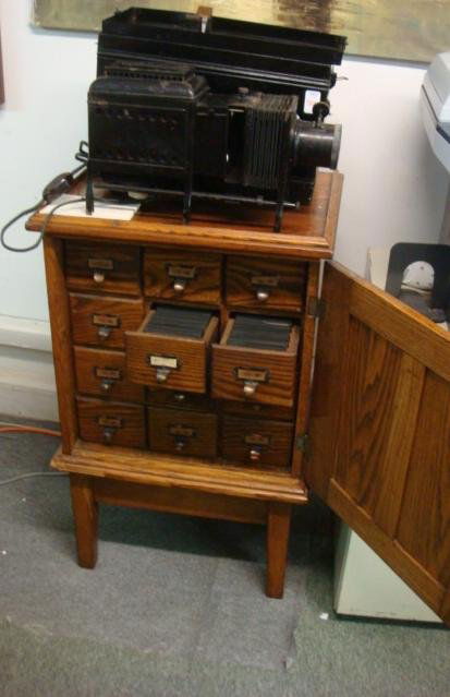 BAUSCH LOMB Model B Magic Lantern and Slides: BAUSCH LOMB Model B Magic Lantern and Slides: Original Steel Case, Bellows to Move Lens to Focus. Over 580 Glass Slides (5 Cracked). Balo Projection Lens. Extended Length 26", Patent 1911. 1 Slide Car