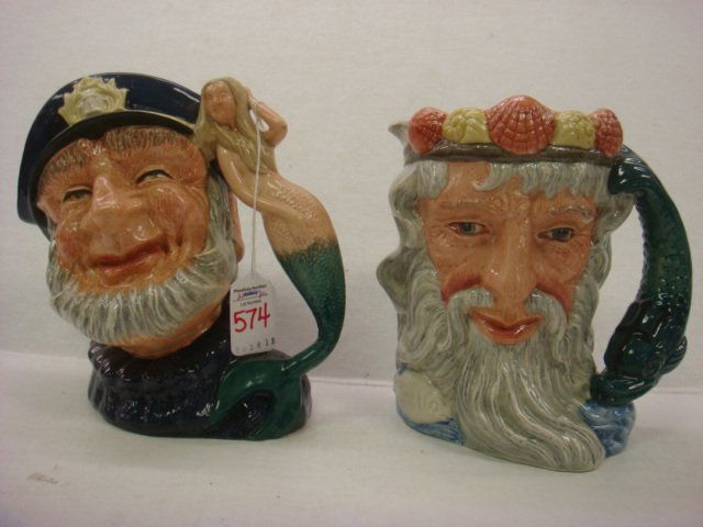 Two ROYAL DOULTON Character Jugs Old Salt, Neptune: Two ROYAL DOULTON Character Jugs Old Salt, Neptune: Old Salt D6551 Copr 1960 with Mermaid Handle is 7 1/4"T. Neptune D6548 Copr 1960 is 7 1/4"T. Both Have Names Molded on Back. (150-250)
