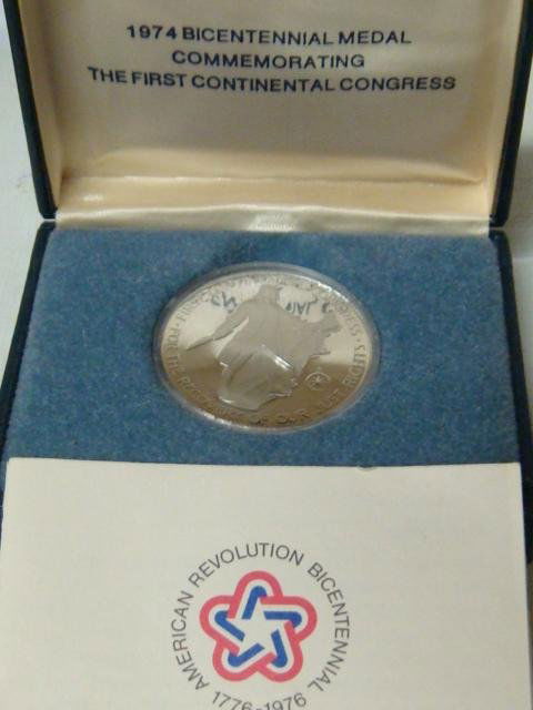 1974 Bicentennial Commemorative Silver Medal: 1974 Bicentennial Commemorative Silver Medal: 1 OZ Sterling Silver Proof Coin Issued 1974 with Image of John Adams with 1st Continental Congress on Reverse. In Display Case with Certificate of Authent