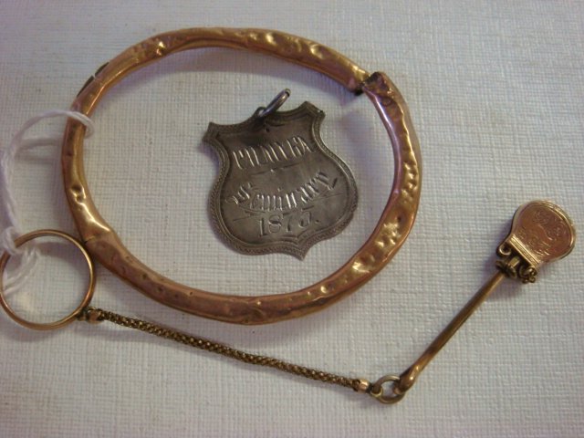 Victorian Hanky Holder and Silvertone Medallion:: Victorian Hanky Holder and Silvertone Medallion: 10KT 4 Pennyweight Gold Teething Rim. Finger Ring with Etched Hanky Holder on Chain. Palmyra (Missouri) 1875 1875 Music Seminary Award Medallion, Given