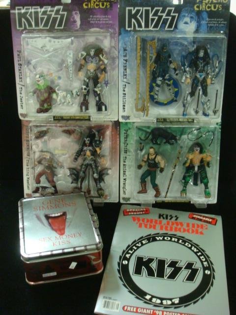KISS Psycho Circus Collectable Memorabilia:: KISS Psycho Circus Collectable Memorabilia: Gene Simmons, Peter Chris, Paul Stanley and Ace Frehley Double Action Figures. Kiss Sex and Money Lunch Box with CD. Kiss Printed Autograph 1997 Tour Book. 