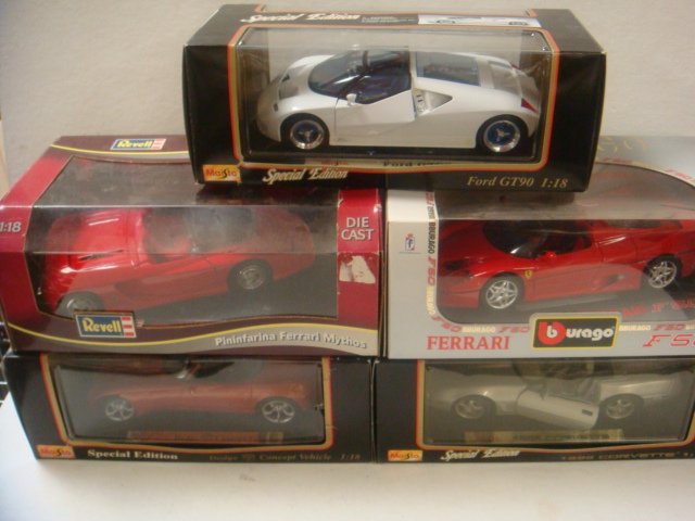 Five Die Cast Vehicles:: Five Die Cast Vehicles: Maisto Dodge, Corvette and Ford. Revell and Burago Ferraris. 1:18 Scale (60-100)