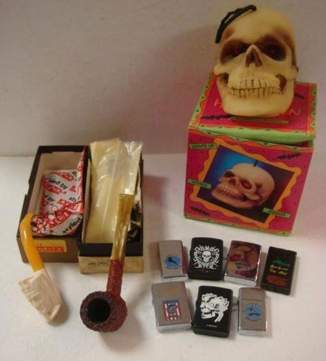 Two Smoking Pipes and Seven Novelty Lighters: Two Smoking Pipes and Seven Novelty Lighters: Lorenzo Meerschaum, Estella Briarwood (Both in Boxes), Novelty Rock & Roll, Navy and Air Force Theme Lighters Zippo Lighters. (50-80)