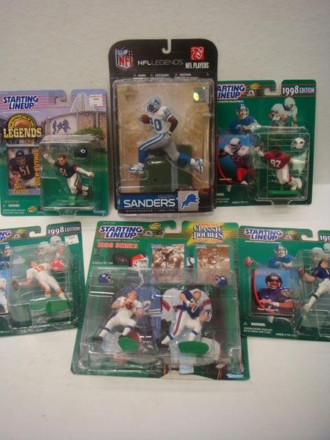 Six STARTING LINEUP Assorted Team Figures:: Six STARTING LINEUP Assorted Team Figures: 1998 Series, SAM HUFF & YA TITTLE, VINNIE TESTAVERDE, SIMEON RICE, BARRY SANDERS, ELVIS GEBAC, and DICK BUTKUS. All in Original Packaging. (30-50)