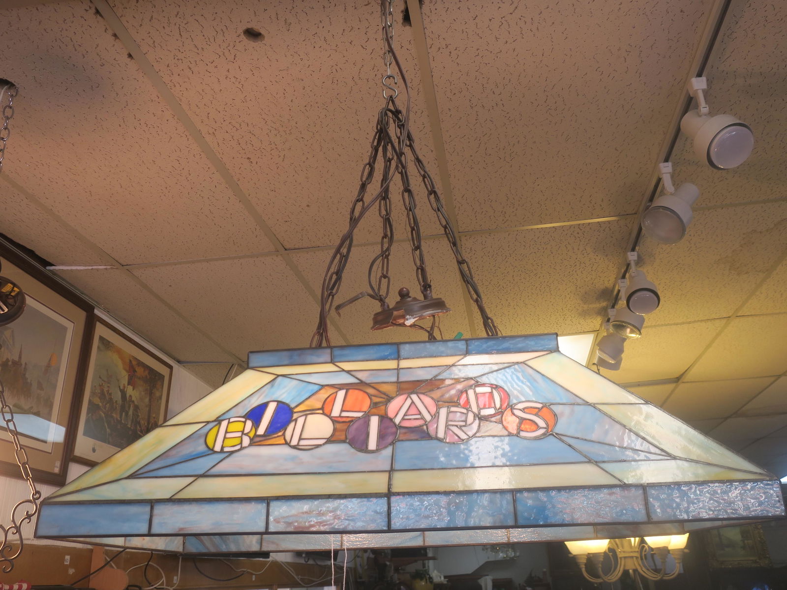 Stained Glass Billiards Table Lamp:: Stained Glass Billiards Table Lamp: 32" X 16" Double Light Hanging Fixture. Trapezoid Shape, Canopy Kit and Chain. "Billiards" Spelled out on Front & Back, "Pool" on Sides-using Cue Balls. (150-300)