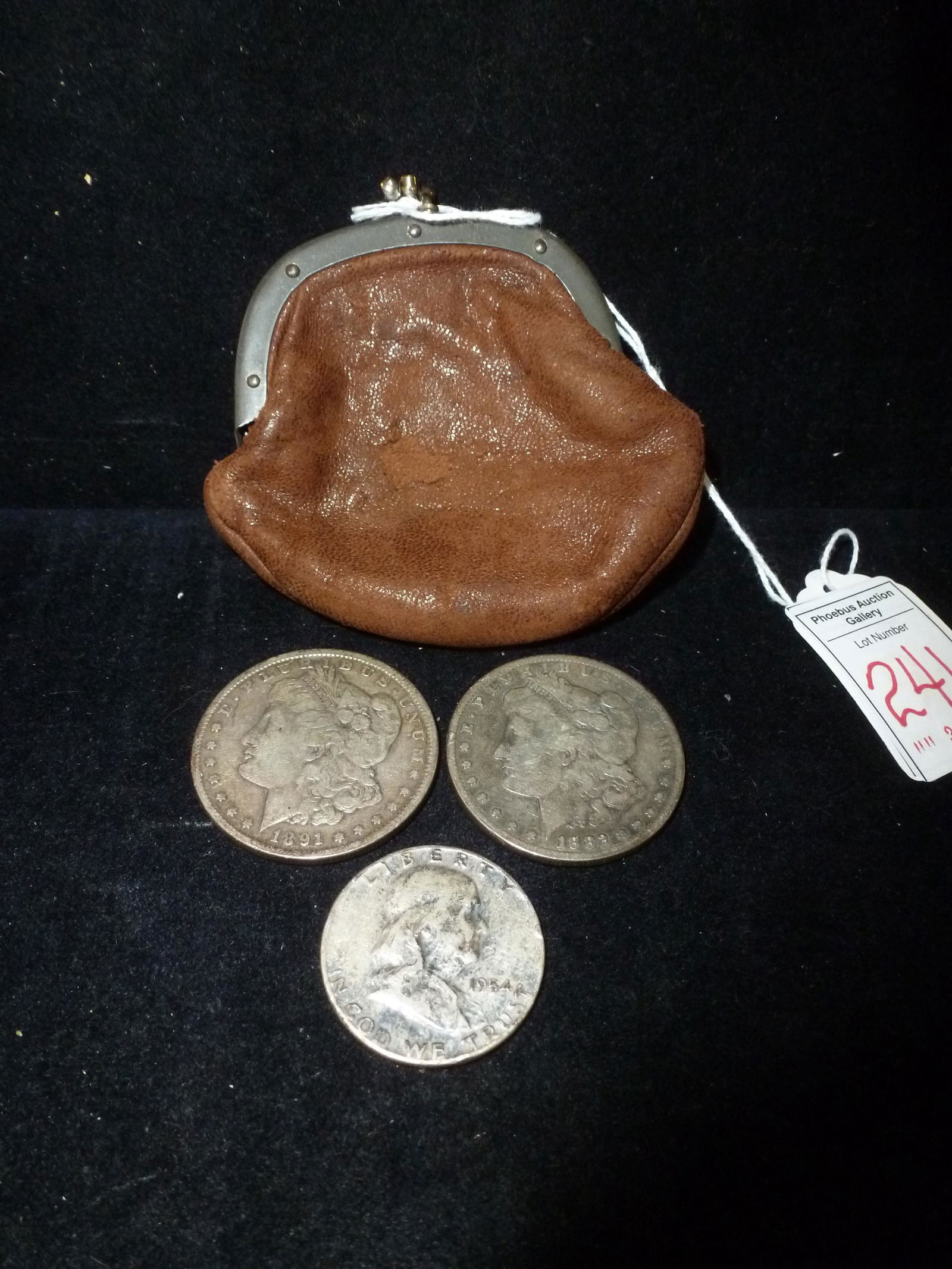 Two Silver Dollars and Franklin Silver Half Dollar: (1 of 2)