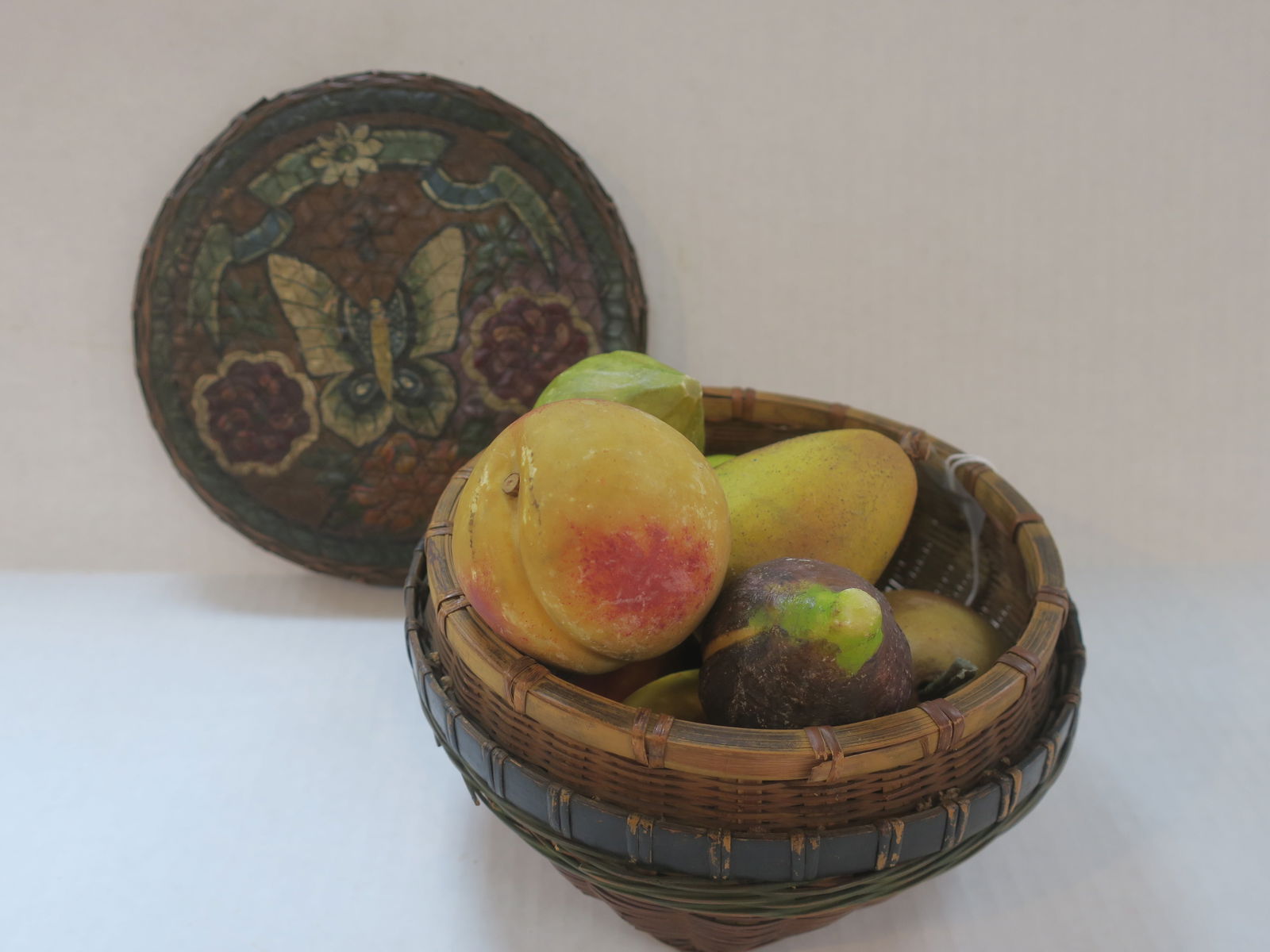 Eight Pieces of Painted Stone Fruit with Basket: (1 of 6)