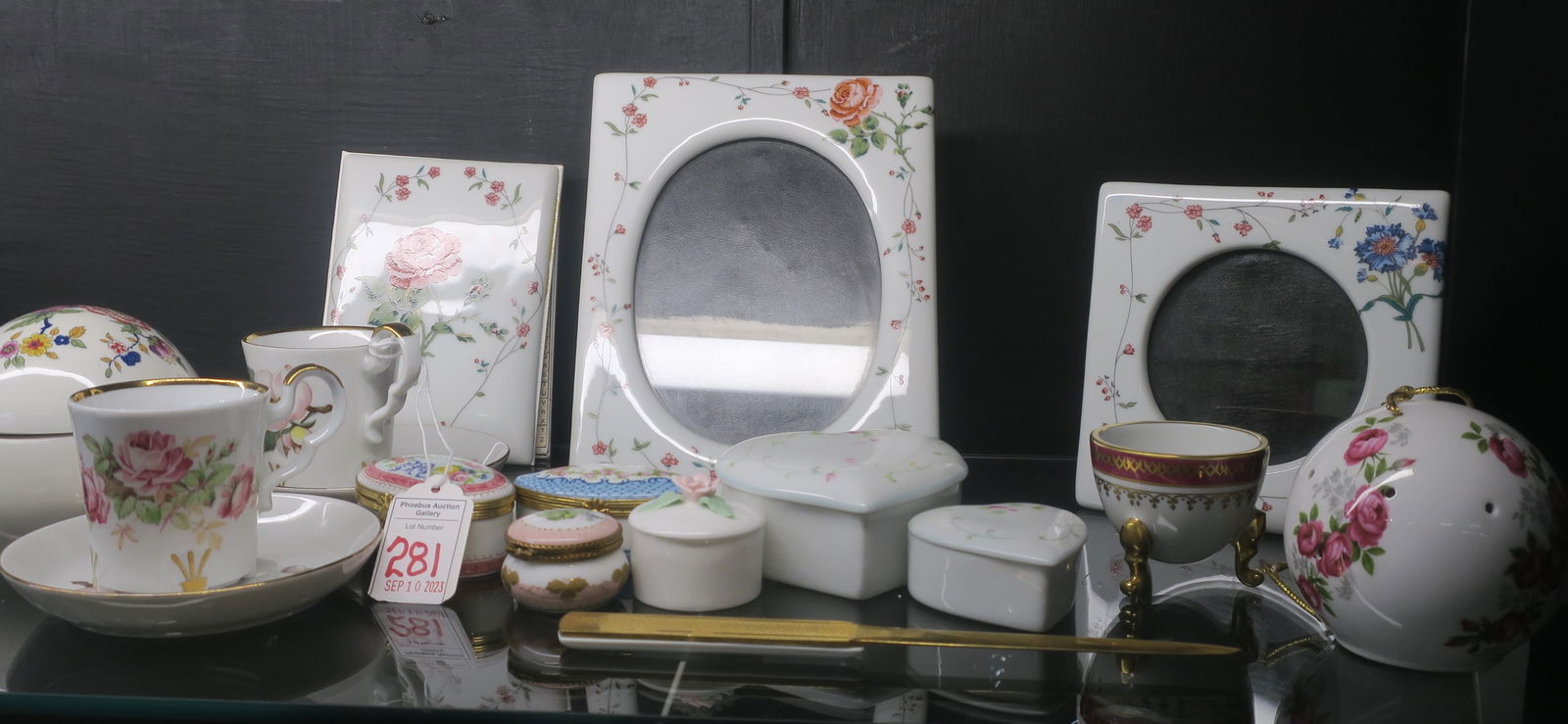 12 LIMOGES Porcelain Table Items & German Cups/Saucers: 12 LIMOGES Porcelain Table Items & German Cups/Saucers Address Book with Matching Letter Opener and 2 Picture Frames, 5" X 5" and 5 1/2" X 7 1/4". Two Heart and Eggs Shaped Boxes. 3 Small Trinket Boxe