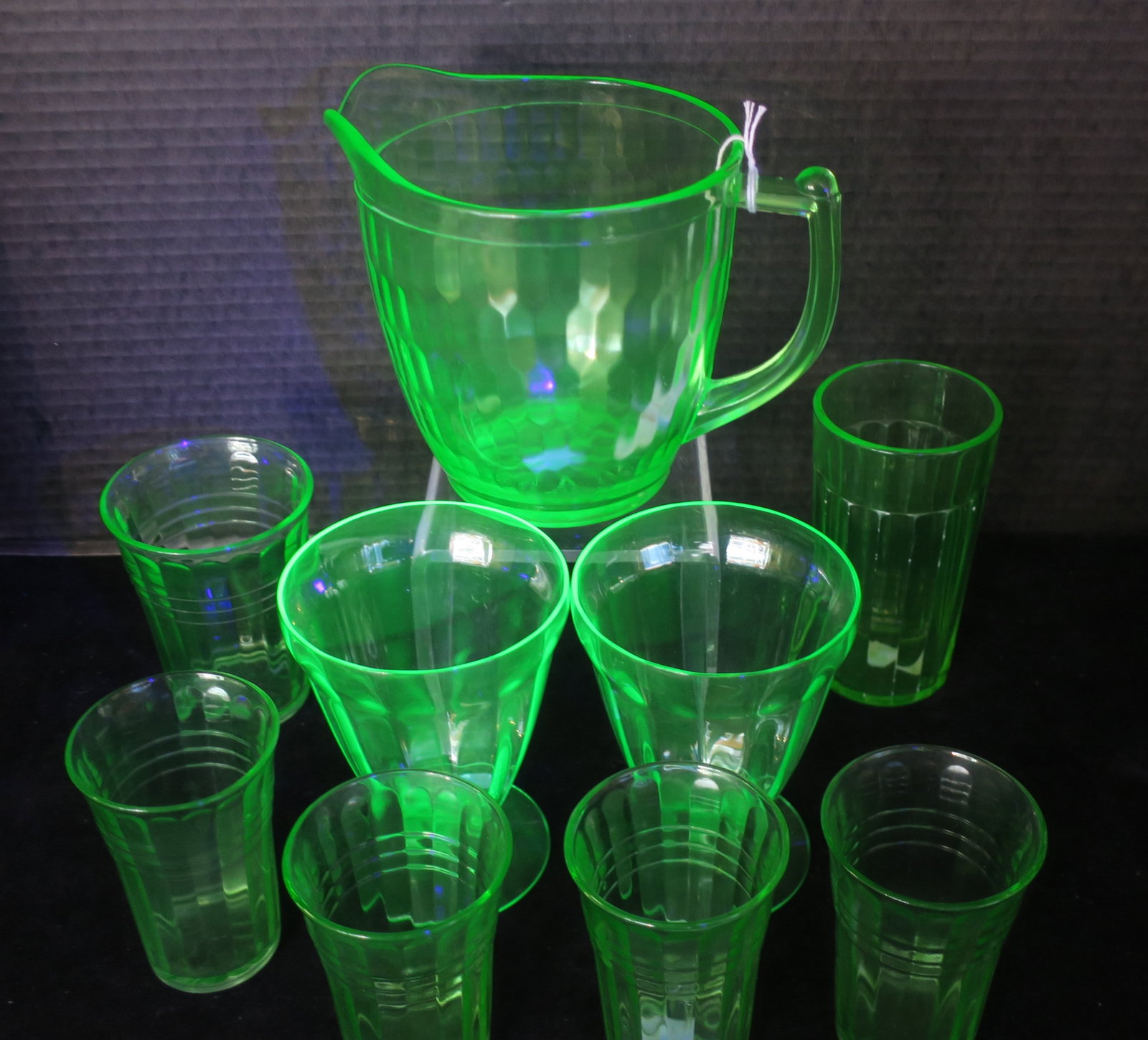 Uranium/Vaseline Glass Pitcher and 8 Glasses:: Uranium/Vaseline Glass Pitcher and 8 Glasses: Jeanette Hex Optic Honeycomb 4 1/8"T Pitcher, Four Hazel Atlas Moderntone 3 3/4" Juice and 4"T Tumbler, Anchor Hocking 5"T Pillar Optic Glass and Two Sund