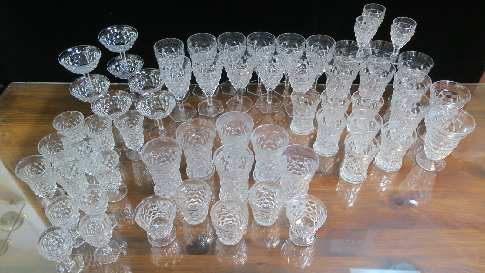 Large Grouping of FOSTORIA American Glassware, 60 PCs:: Large Grouping of FOSTORIA American Glassware, 60 PCs: Includes Two Footed Oyster Cocktails, Six 5 3/8"T and Seven 4 1/4"T Flared Tumblers, 3 Old Fashioned, Seven 4 3/8"T Hex Foot Wine Glasses, Eleven
