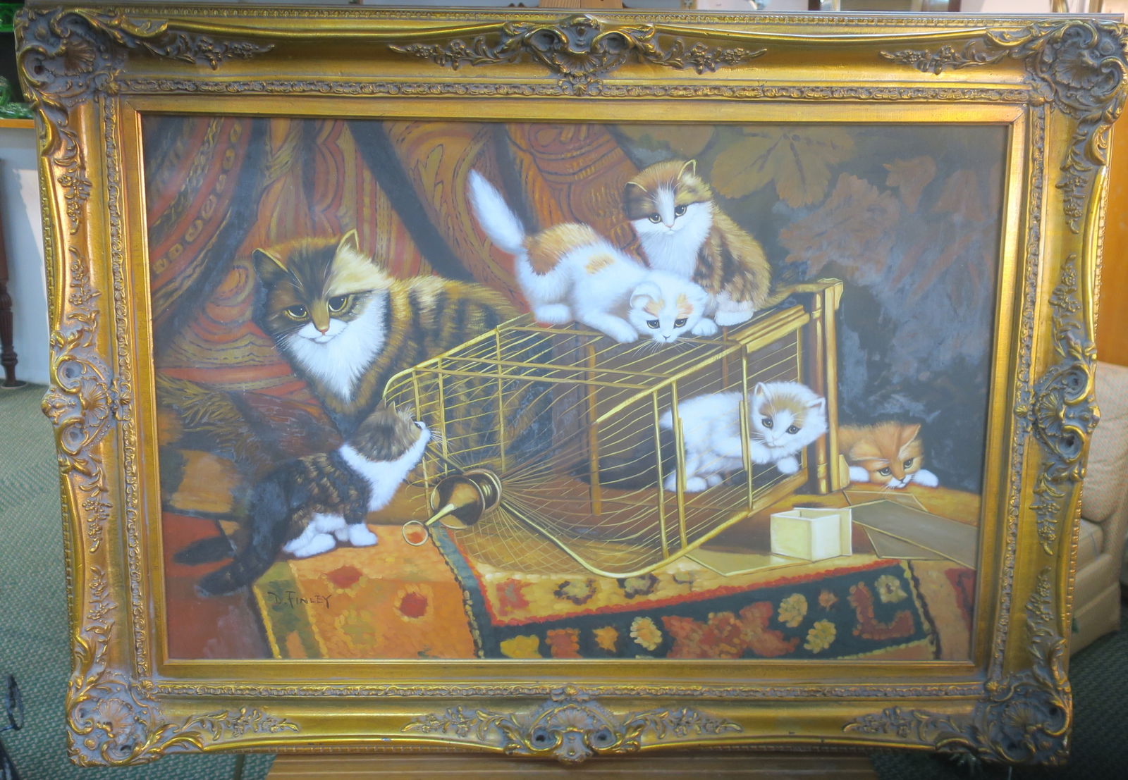 Kittens with Birdcage Painting Signed D. FINLEY:: Kittens with Birdcage Painting Signed D. FINLEY: Mother Cat Watching Five Babies Checking Out Birdcage for Missing Bird. Signed Lower Left. Ornate Molded Gold Frame. 33" X 45" Overall. (200-400)