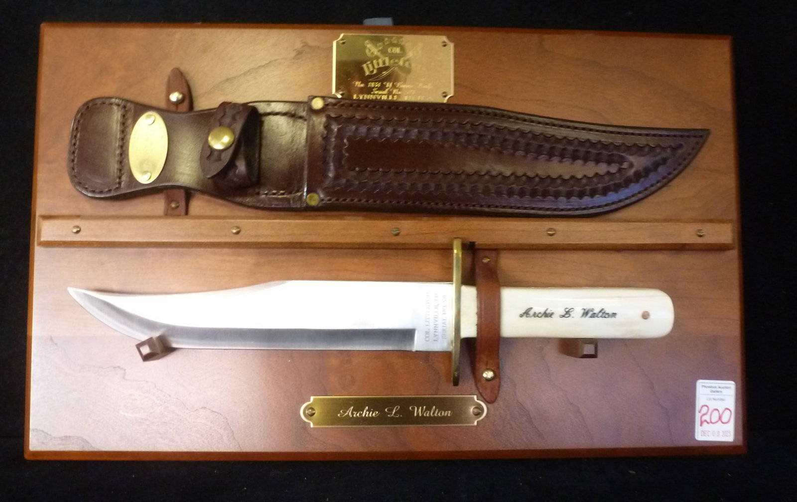 Personalized Bowie Knife by COL LITTLETON #521:: Personalized Bowie Knife by COL LITTLETON #521: Bowie Knife with Bone Grip with Owners Name Engraved, 9" Blade Engrave COL LITTLETON, LYNNVILLE TN. SERIAL NO. 521. Leather Tooled Sheath with Brass Tag