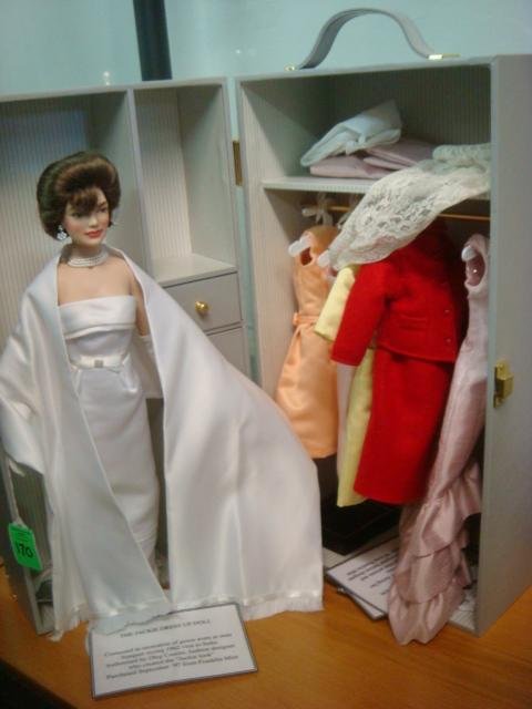 Jacqueline Kennedy Dress Up Doll with Trunk, Cloth: Jacqueline Kennedy Dress Up Doll with Trunk, Clothing: Oleg Cassini Gown on Doll with 5 Additional Outfits, Hats, Shawls, Scarves in a Fitted Trunk. 15" Vinyl Doll from Franklin Mint. Original Boxes. 