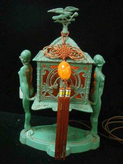 FRANKART Green Figural Radio Lamp, Oriental Design: FRANKART Green Figural Radio Lamp, Oriental Design: Has Two Standing Nudes with Pagoda Between Them. Bird Finial. Amber Glass Panels. 14 1/4"T Overall, 9"W Base. (200-300)