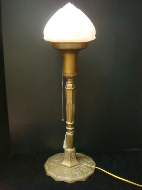 Signed MILLER Cast Metal Zodiac Table Lamp, Shade: Signed MILLER Cast Metal Zodiac Table Lamp, Shade: Tall Column Metal Base is 20 1/2"t with Zodiac Signs at Bottom. Molded White Glass Torch Shade. (-)