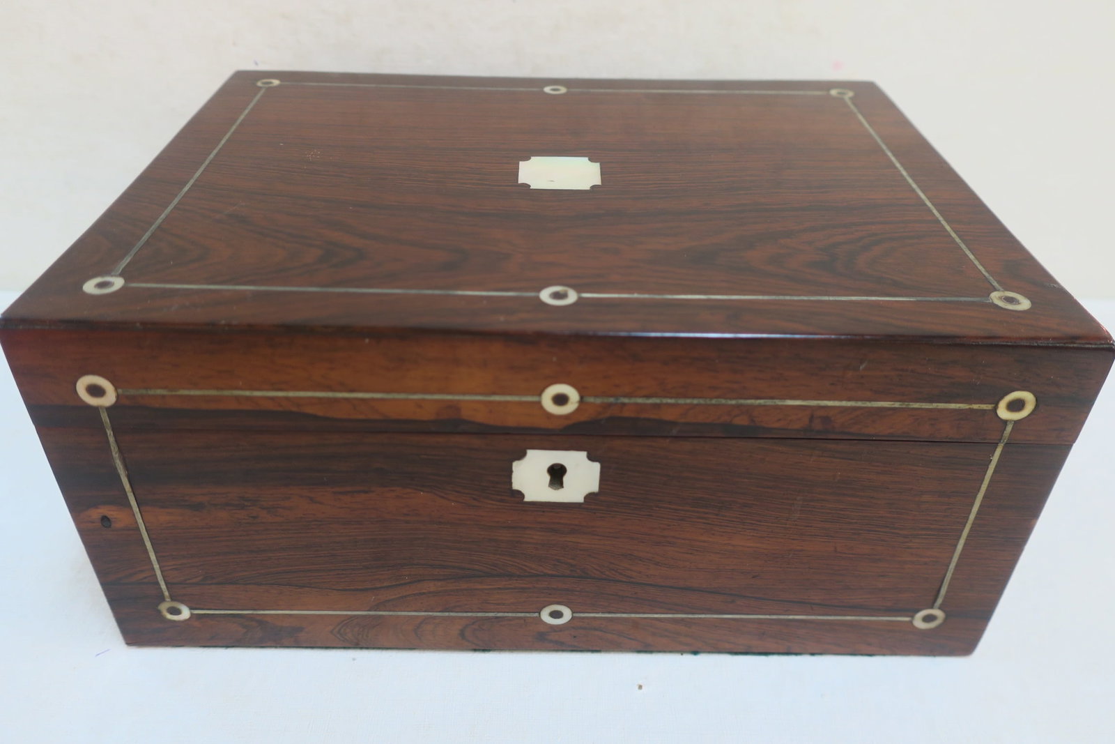 Victorian Rosewood Sewing or Letter Box with MOP:: Victorian Rosewood Sewing or Letter Box with MOP: Mother of Pearl Dots Connected by Silver Lines on Top and Front. Mother of Pearl Center Medallion and Escutcheon. No Key. Missing Tray. Padding in Lid