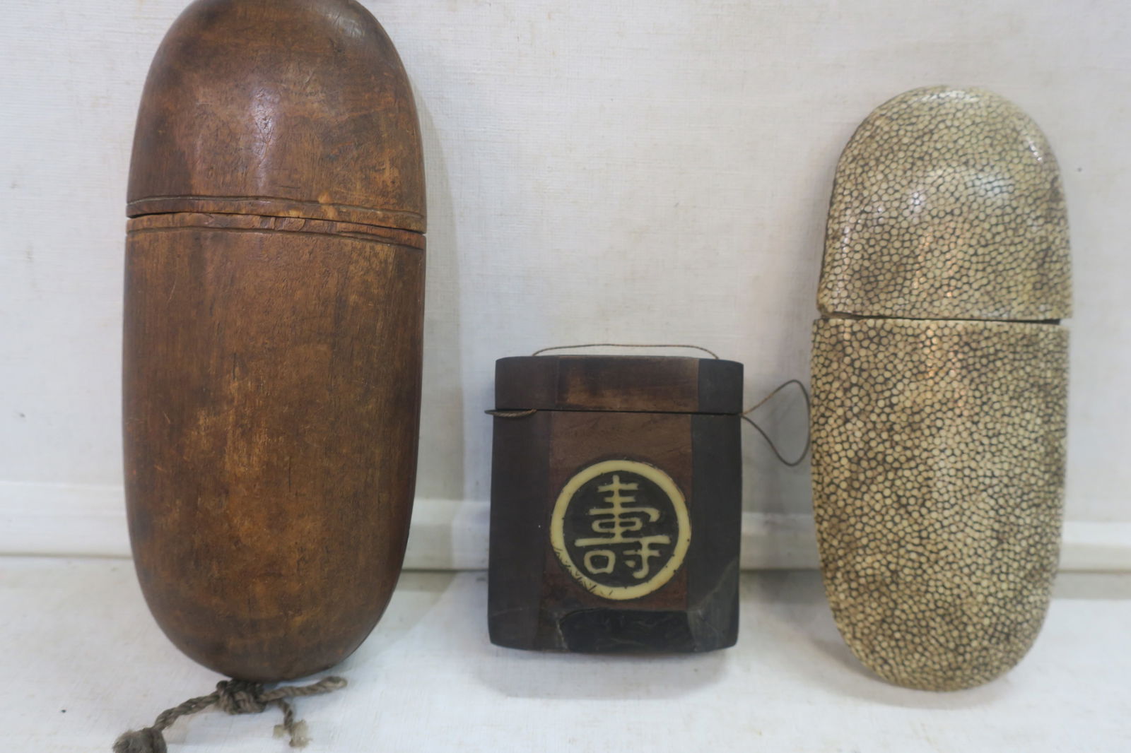 Chinese Snuffbox, Eyeglass Case and Brushholder:: Chinese Snuffbox, Eyeglass Case and Brushholder: Eight Sided Carved Wood Snuffbox with Carved Bone Inlay, 3" Tall. 19th Century Shagreen Glasses Case Made of Shark or Stingray Skin, 6" Long. Wooden Ov