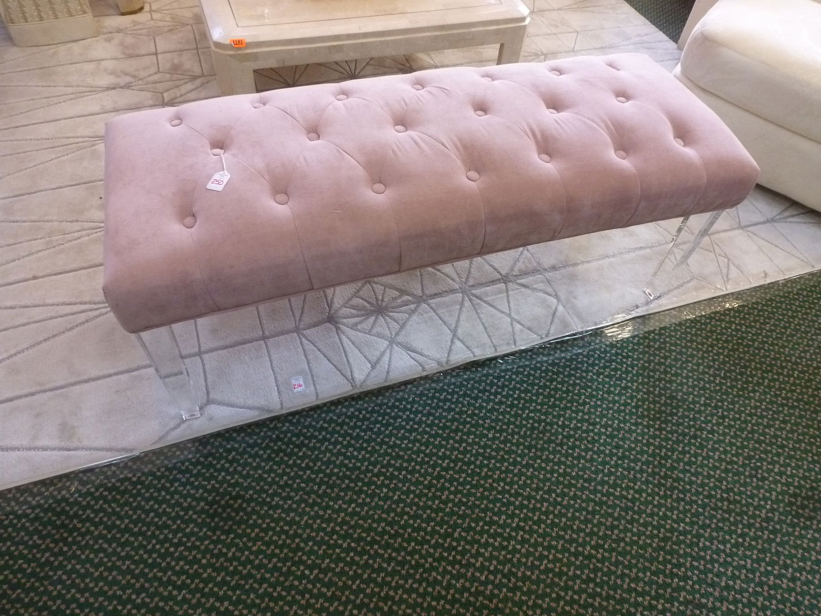 Pink Upholstered Bend with Lucite Legs:: Pink Upholstered Bend with Lucite Legs: Button Tufted Pink Upholstery, Square Tapering Lucite Legs. 18"T, 49" X 18". (200-400)