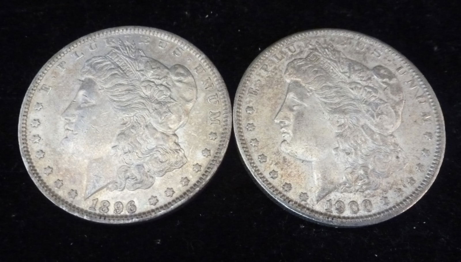 Two Collectible Morgan 90% Silver Dollars: (1 of 3)