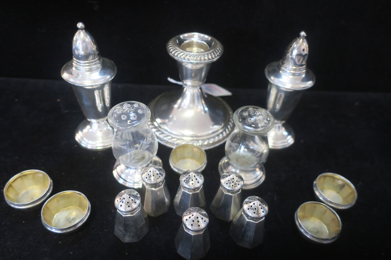 Sterling Shakers, Salt Dips and Candlestick:: Sterling Shakers, Salt Dips and Candlestick: Quaker Silver Co 3" Etched Glass Salt & Pepper Shakers with Weighted Bases. Crown Salt & Pepper 4 1/2"T with Weighted Bases. Six Webster 3/4"T Pepper Shake