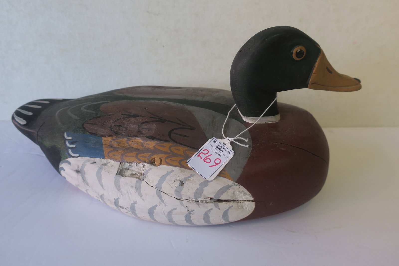 Mallard Decoy HOWARD BREISCH, Bethlehem, Handcrafted:: Mallard Decoy HOWARD BREISCH, Bethlehem, Handcrafted: 7" Tall and 14" Long Our Plump Mallard is Signed on the Bottom. Carved Recessed Eyes. Very Good Condition. (100-300)