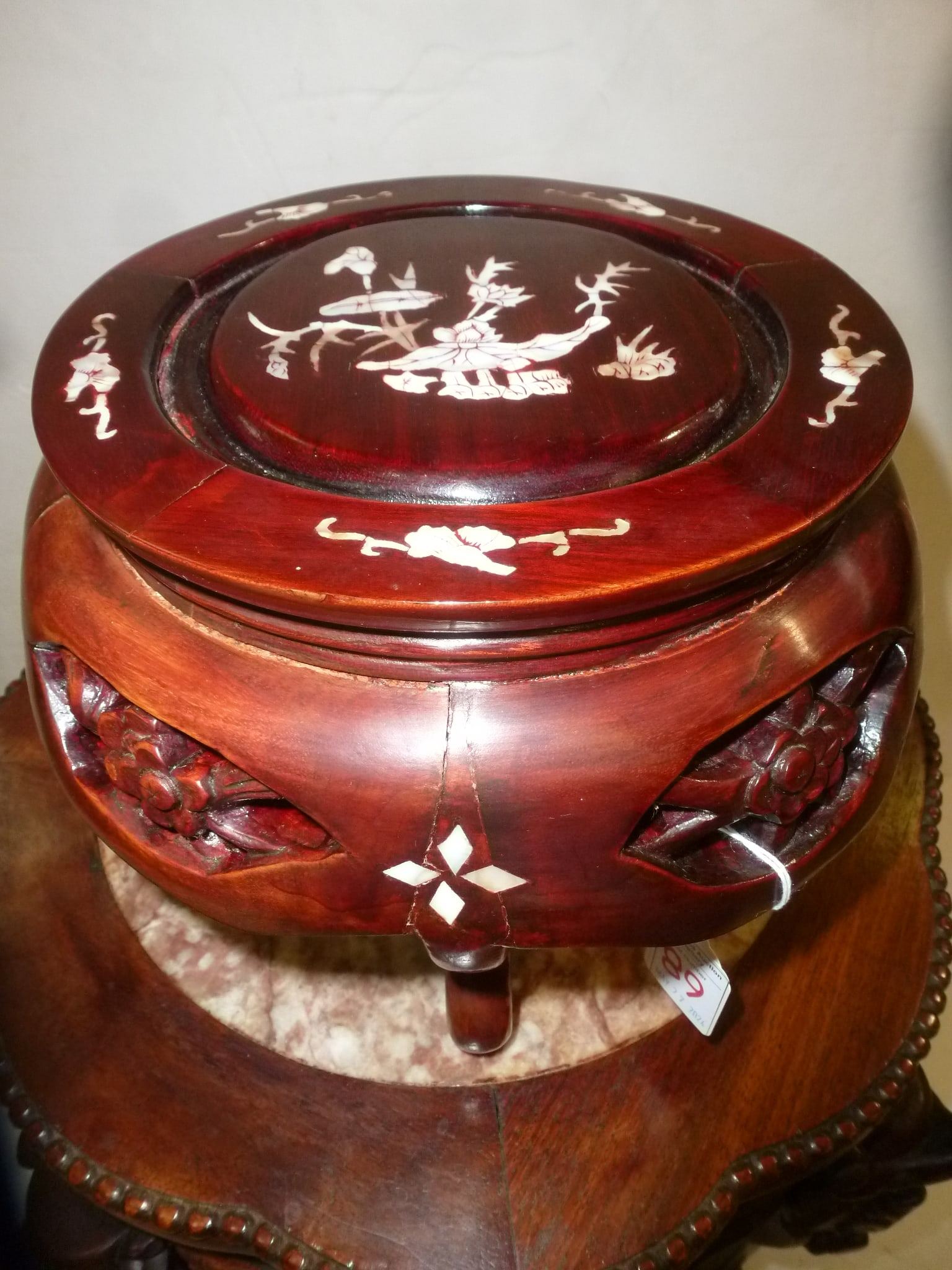 Asian Rosewood and Mother of Pearl Mini Garden Seat:: Asian Rosewood and Mother of Pearl Mini Garden Seat: Mother of Pearl Floral Inlay on Top. Open Carved Sections having Flowers and Stems, Diamond Shaped Mother of Pearl Between Carvings of Baluster Leg