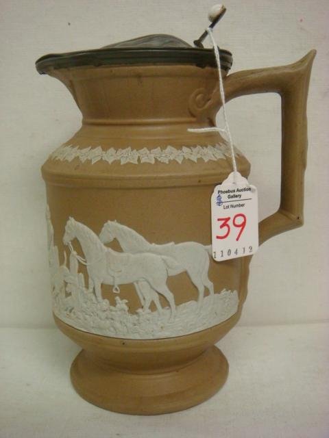 BROWNHILLS POTTERY CO. Jasperware Syrup Pitcher: BROWNHILLS POTTERY CO. Jasperware Syrup Pitcher: CA 1872-1890, Made in Tustall, Stoke-on-Trent, Staffordshire. Factory only Open 18 years. TAP Ground with Applied White Fox Hunt Scene. Tin Lid with Wh