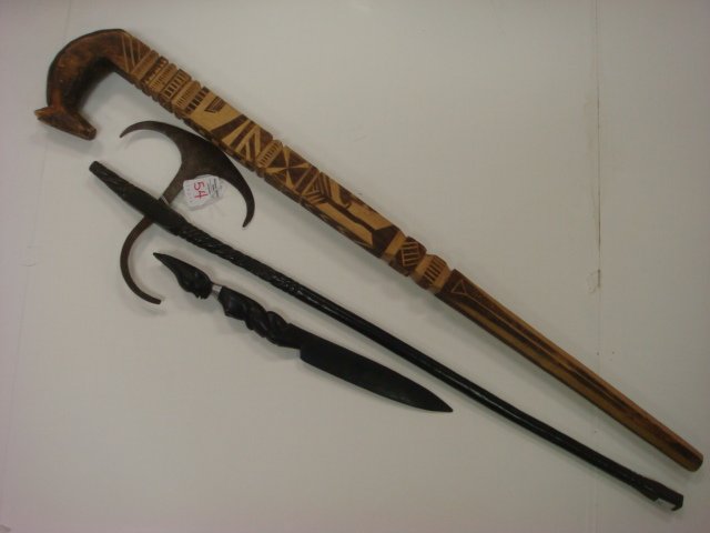 Battle Axe, Ebony Letter Holder and Hand carved Can: Battle Axe, Ebony Letter Holder and Hand carved Cane: 28 1/2" Battle Axe with Carved Handle and Halberd Blade. Ebony Wood Letter opener with African Princess Handle. 1943 Hand carved Cane with Militar